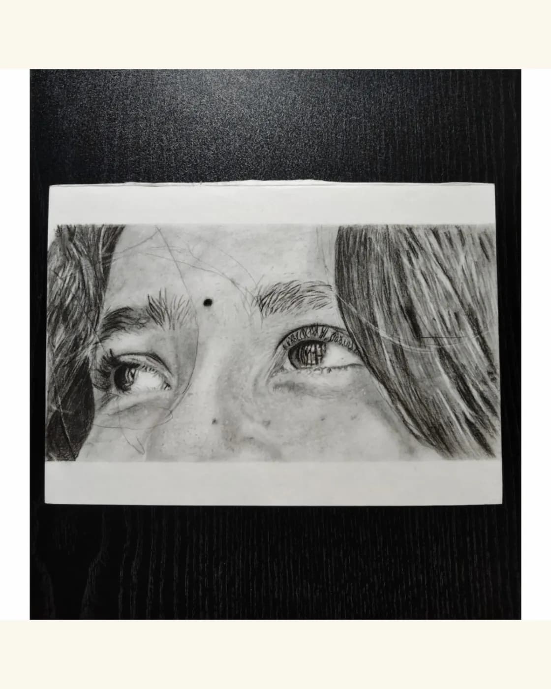 Handmade pencil sketch of a girl looking up, photo 1 of 1