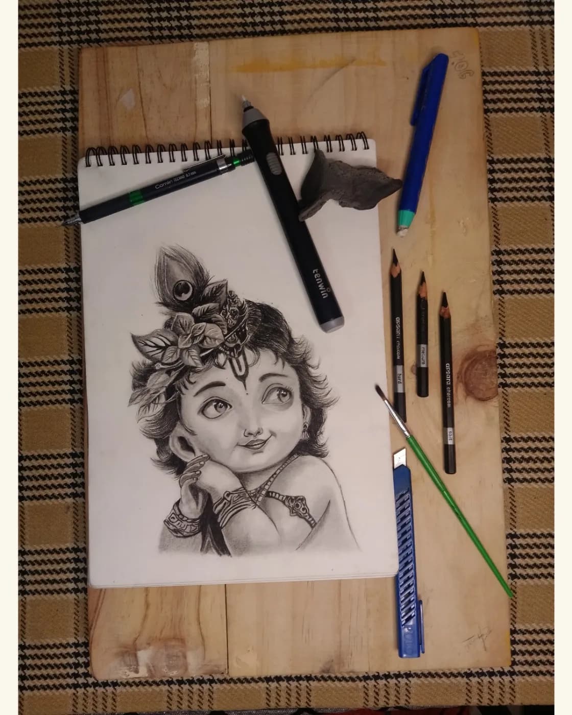 Handmade baby Krishna charcoal portrait, photo 2 of 3