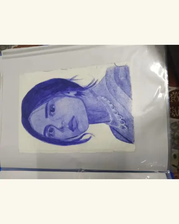 Potrait of Kalyani Priyadarshan with pen